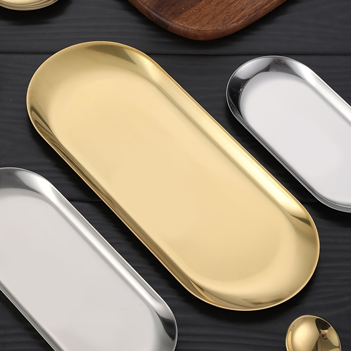 Oval-shaped stainless steel food tray for breakfast in kitchen or restaurant.