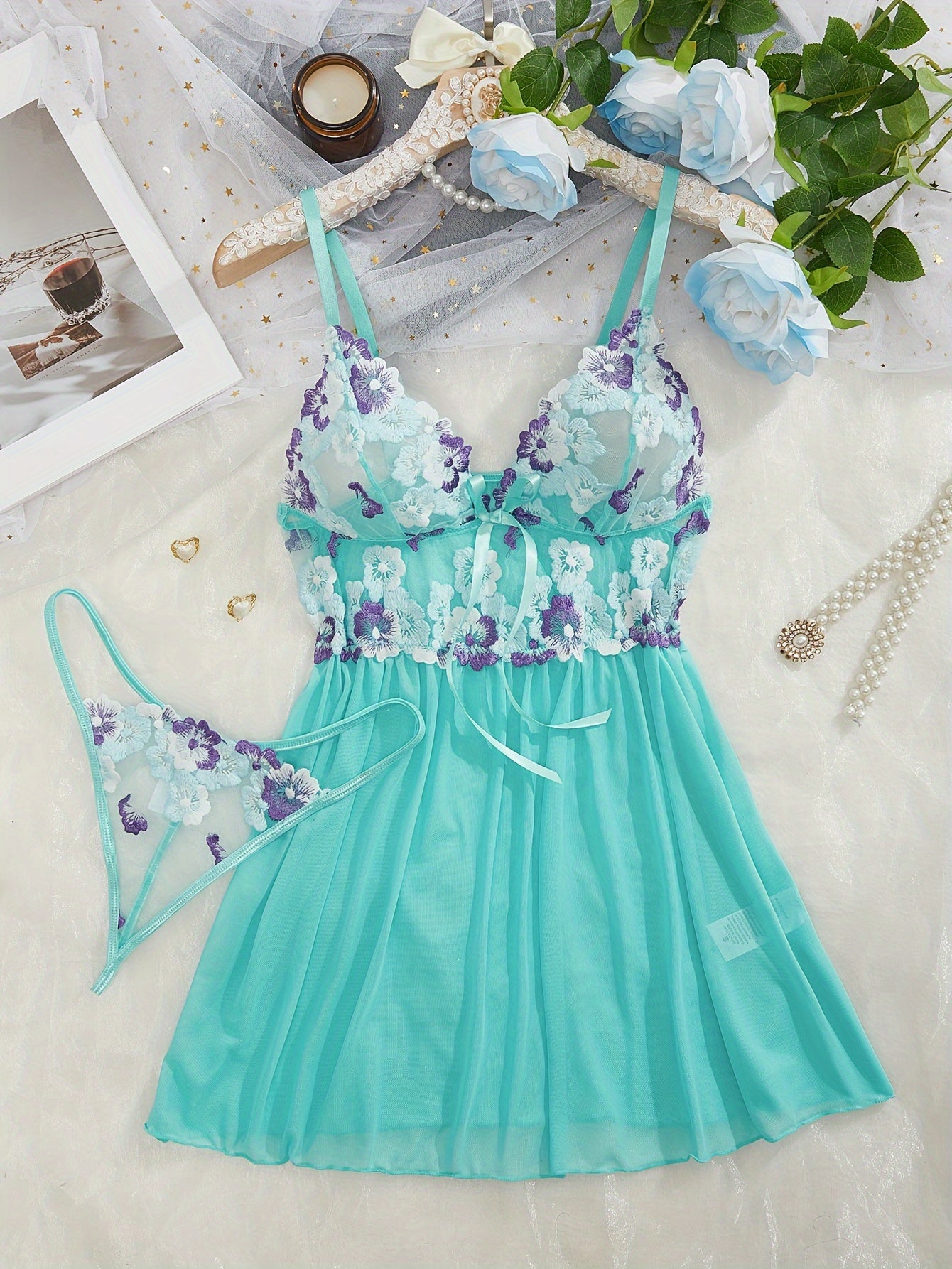 Women's sexy clothing set includes embroidered flower pattern babydoll, deep V slip dress, and thong.