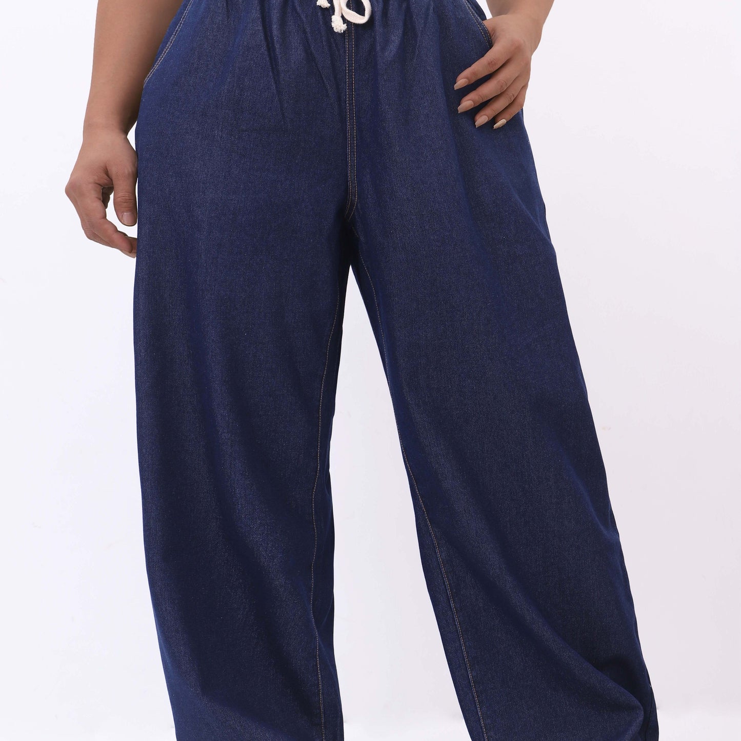 Women's plus size wide-leg jeans with high rise, drawstring waist, solid color denim for spring/fall.