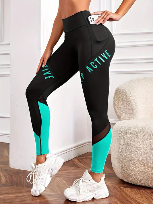 High waisted yoga leggings with pockets and color-block letter print for women's casual sports wear.