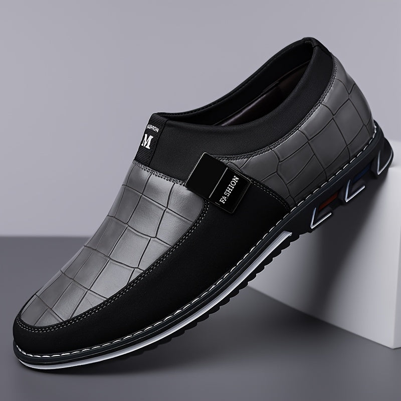 Men's slip-on business casual shoes with synthetic microfiber leather, anti-slip rubber sole, PU inner lining, and low top design for daily wear in spring/fall season.