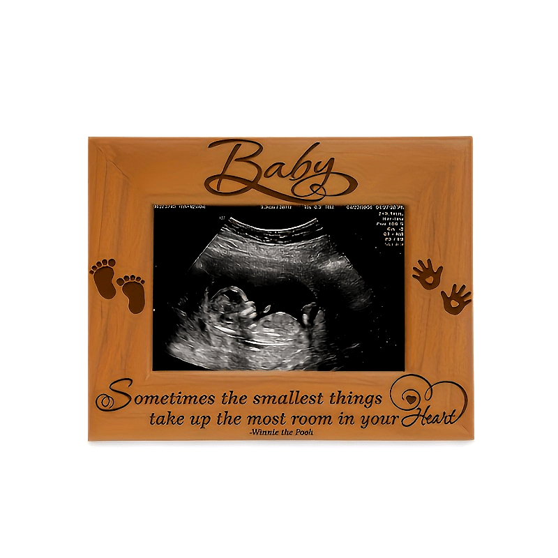 Retro yellow wooden frame designed for children's memorial with creative hand and footprint designs. Perfect for newborns, this four-dimensional frame can be used as a decoration for the home or wall. Capture precious memories in this unique photo frame.