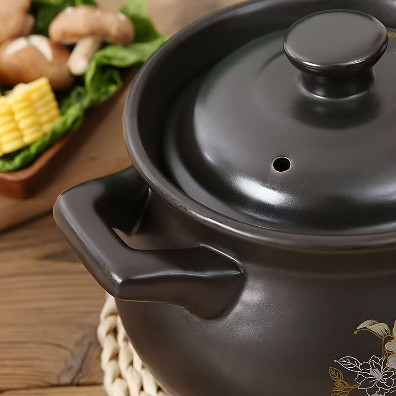 Black ceramic pot with dual handles, holding up to 71oz - suitable for high and low temperatures. Designed for 2-3 people, perfect for home kitchens.