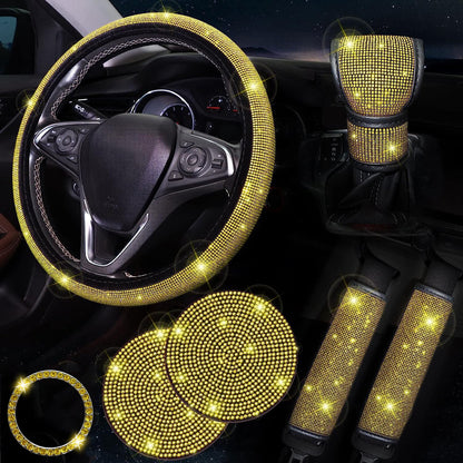 Women's bling car accessories: steering wheel cover, coasters, seat belt shoulder pads, ring sticker, and gear shift cover.