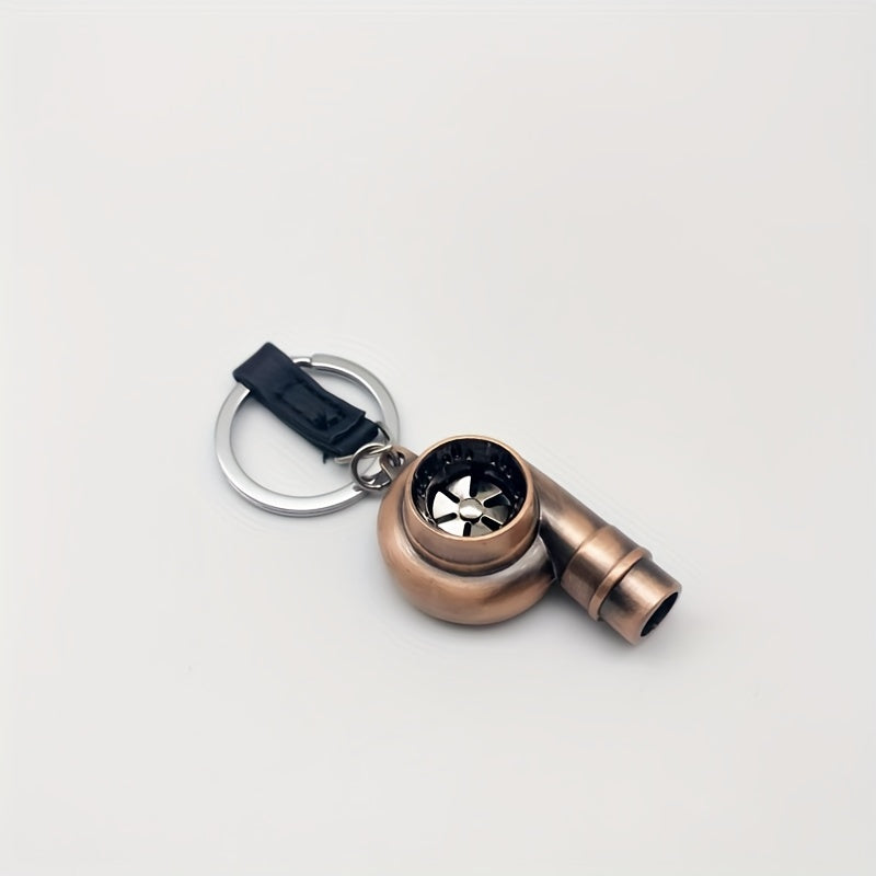 Keychain featuring a rotating turbine design, perfect for car enthusiasts. This creative accessory also doubles as a key holder and includes a turbine whistle feature. Ideal as a unique gift option.