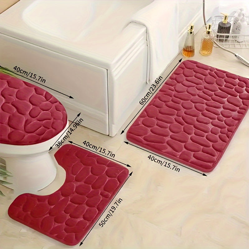 3-piece geometric-pattern bath rug set made of non-slip knit weave polyester with quick-drying memory foam. Machine washable. Includes U-shaped toilet rug for comfortable and absorbent bathroom decor.