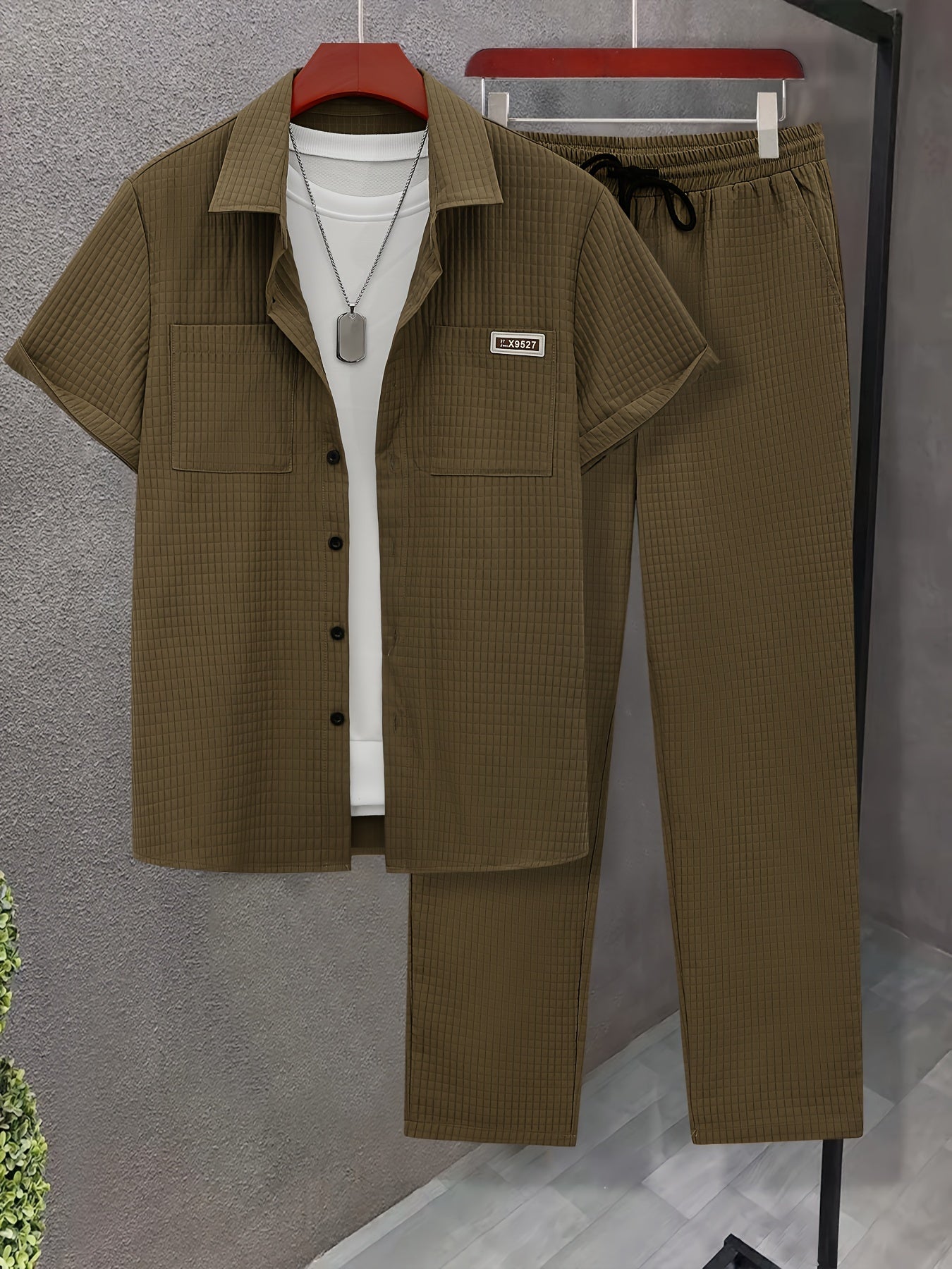 Men's casual 2-piece outfit with solid color button-up shirt and drawstring pants, featuring breathable short sleeve shirt and pants set.