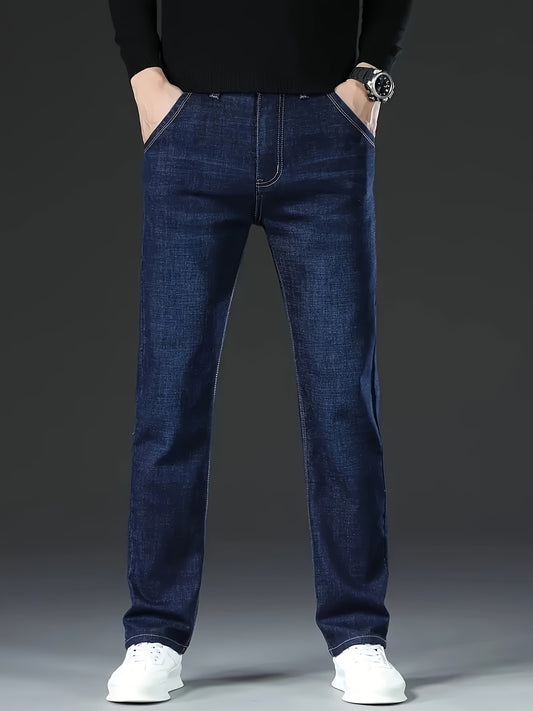 Classic straight-leg jeans for men in a comfortable business-casual style, made from a cotton blend with stretch, and solid washed denim suitable for year-round wear.