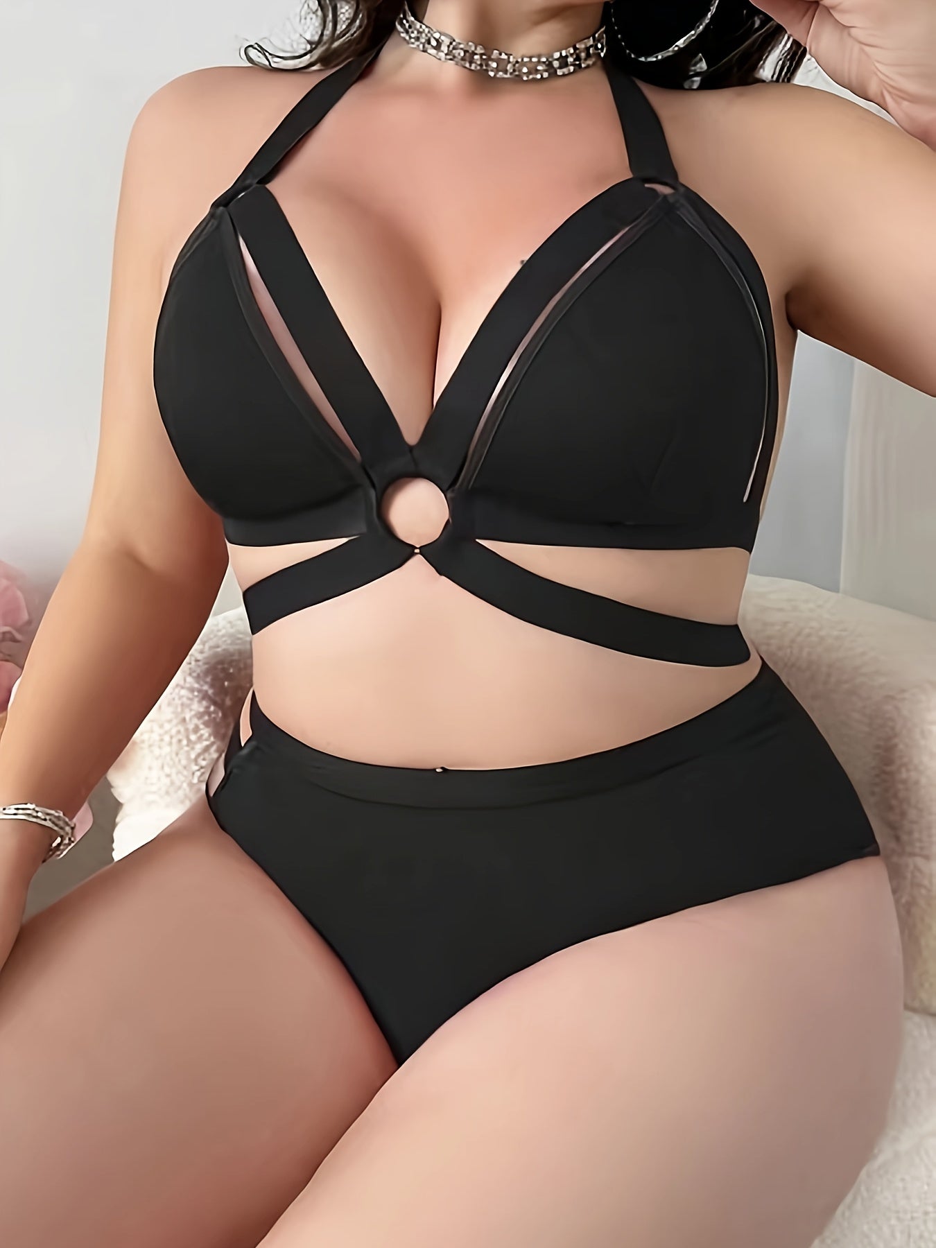 Plus size lingerie set with cross detail, medium stretch knit fabric, comfortable bustier and corset costume.