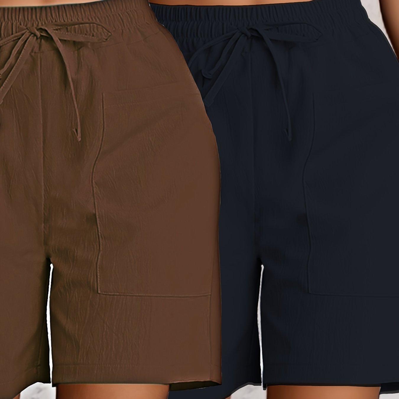 2-Pack of Women's breathable cargo shorts in solid colors. Made of lightweight polyester with dual pockets and drawstring detail. All-season fashion.