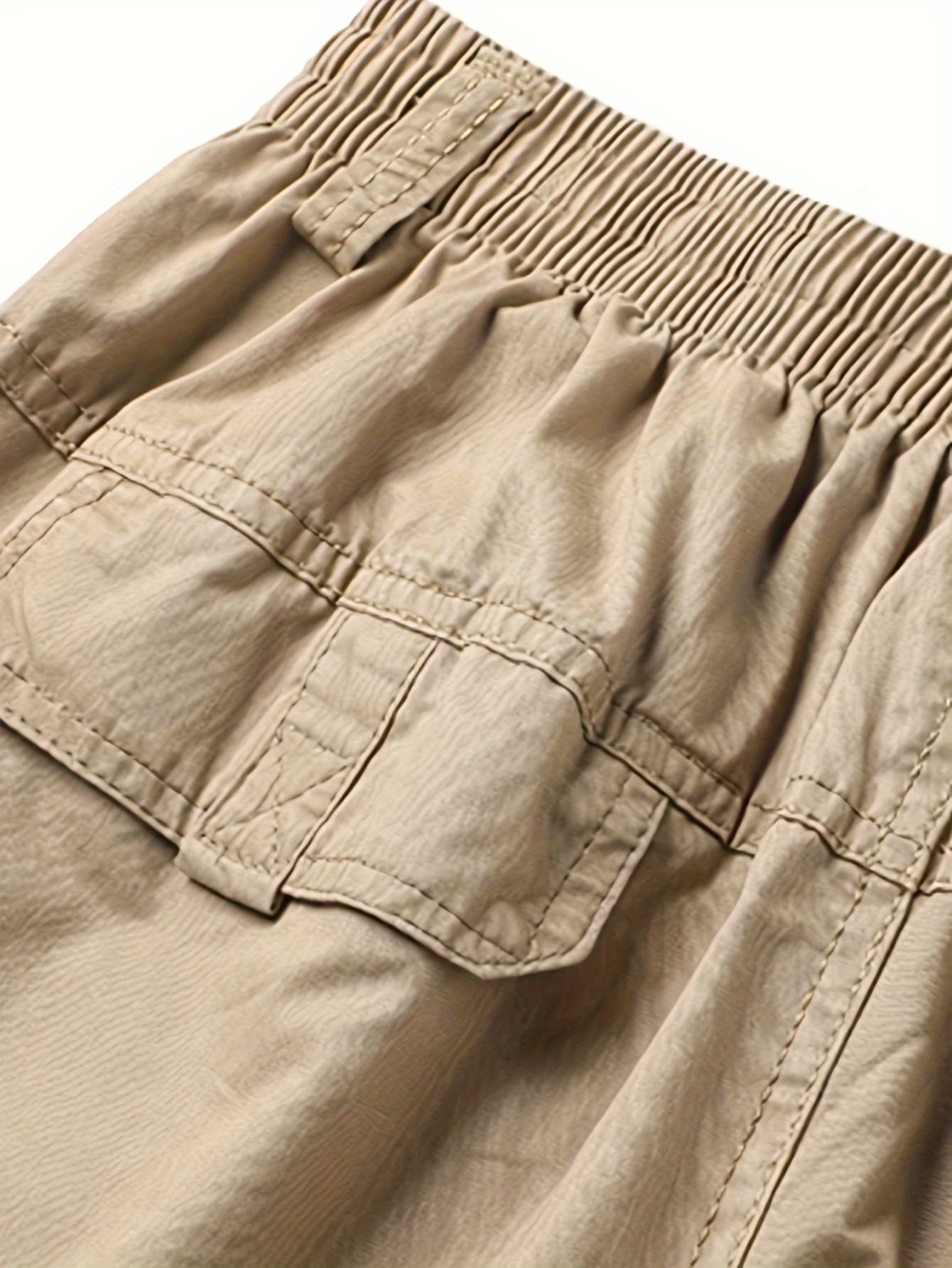 Classic Men's cargo pants with elastic drawstring waist in solid color for Spring/Fall comfort.