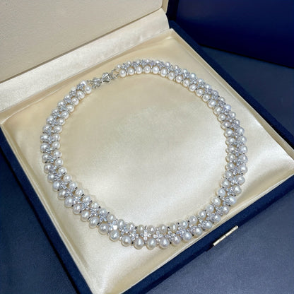 This elegant double-layered necklace features fashionable natural freshwater pearls, perfect for a high-end banquet, wedding, evening event, or as a gift. It is versatile and can be paired with any outfit to add a touch of sophistication. The necklace