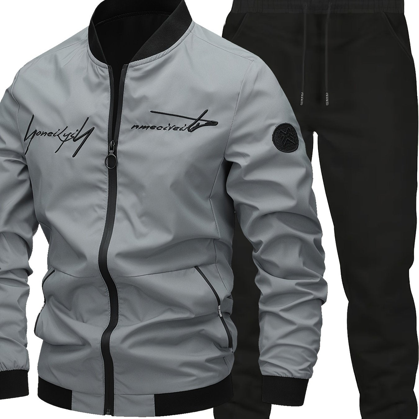 Men's Classic Bomber Jacket & Jogging Pants Set in sleek black with letter embroidery. Made of durable polyester with elastic cuffs and waistband. Ideal for outdoor activities and casual