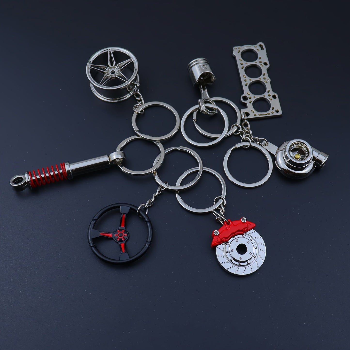 Set of 7 Car Enthusiast Keychains - Sleek Black Zinc Alloy, featuring Engine Block, Turbo, Wheel Hubs, and More - Ideal Gift for Guys