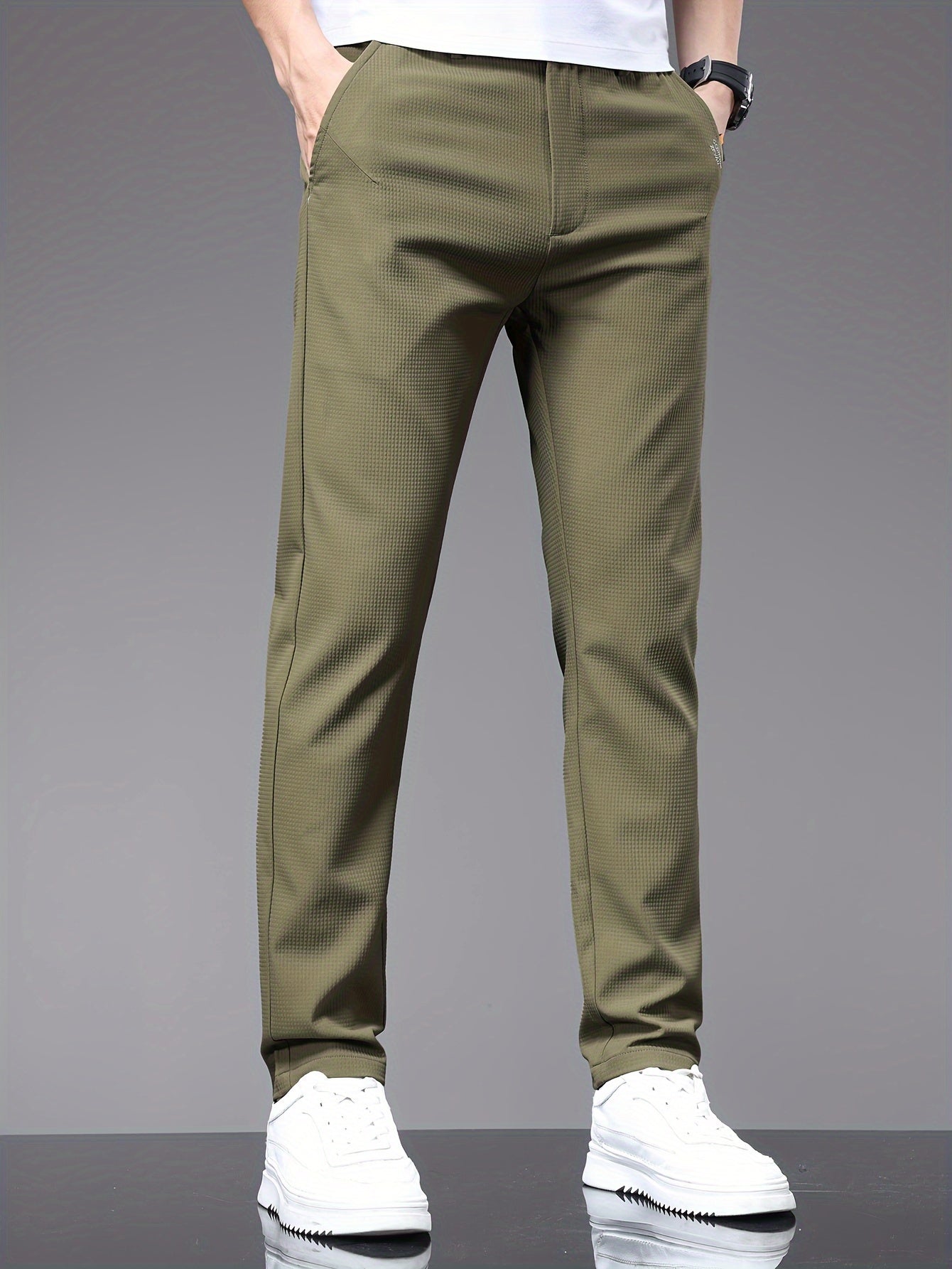 Men's slim fit pants with pockets, perfect for outdoor activities in spring and autumn.