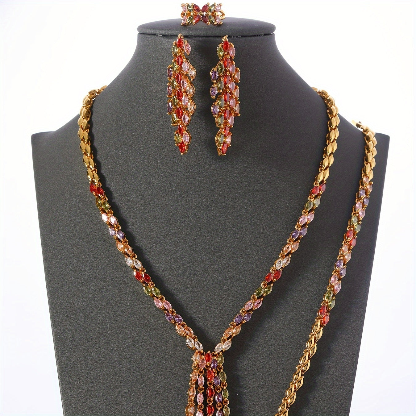 One set of Middle Eastern Saudi Arabian wedding jewelry, consisting of four pieces: a full tassel color cubic zirconia copper set for women, including 1 necklace, 1 bracelet, 1 pair of earrings, and 1 ring.