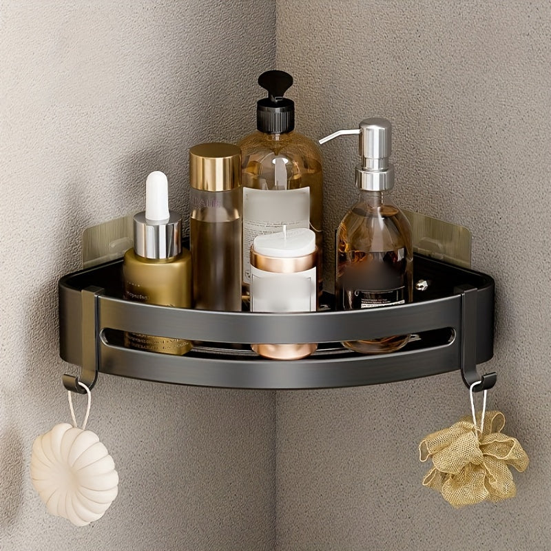 Wall-mounted bathroom storage rack for shampoo, shower gel, and cosmetics; made of space aluminum with no need for drilling.