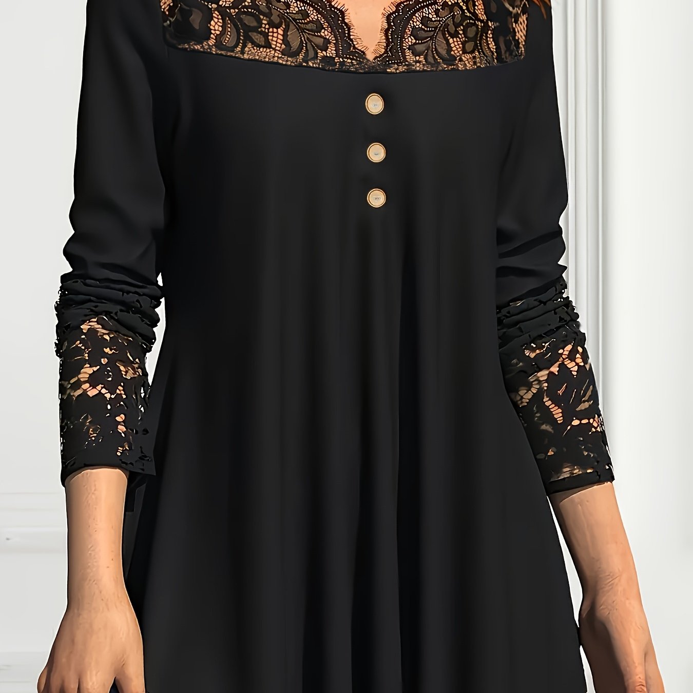 Stylish lace-trim V-neck tunic for plus sizes, with long sleeves, stretchy semi-sheer fabric, color block design, and loose fit.