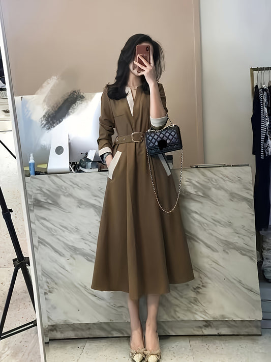 Stylish midi dress in solid brown polyester with V-neck, A-line cut, belt, and long sleeves. Suitable for spring, summer, or fall, and is machine washable.