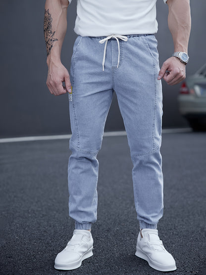 Trendy men's tapered jeans with waist drawstring