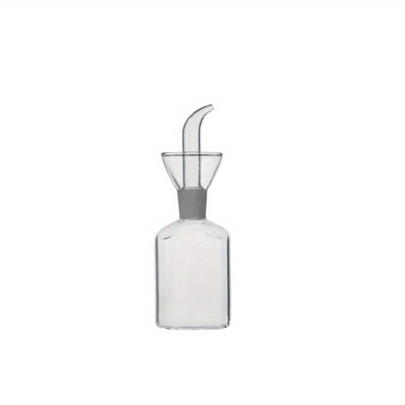 Transparent oil dispenser available in 5oz, 6.7oz, and 15.2oz sizes. This leakproof glass bottle is perfect for storing olive oil, vinegar, and other liquid seasonings. Suitable for cooking, baking, salad, and grilling. A must-have in your kitchen