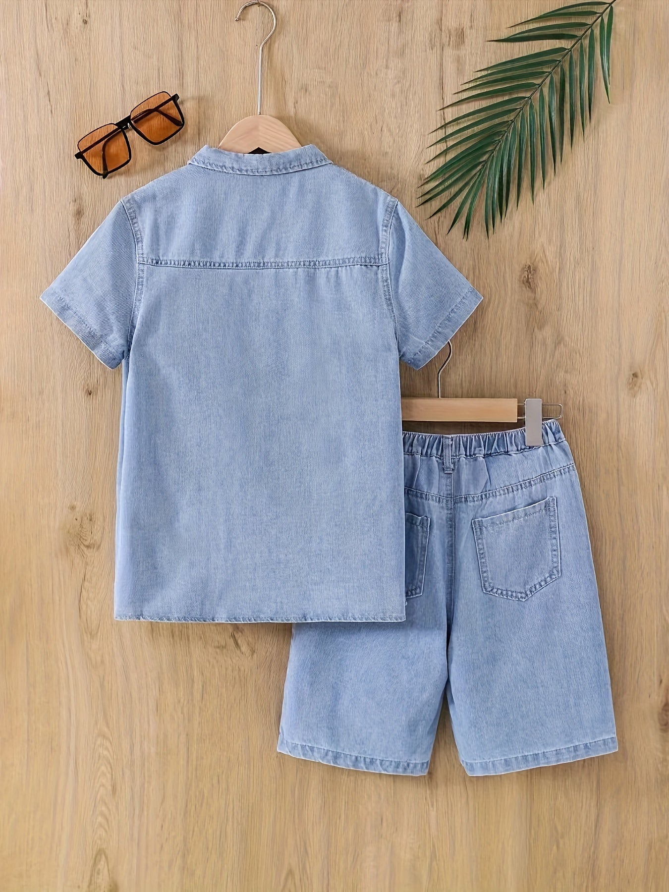 Boy's casual denim outfit includes short sleeve shirt and ripped short jeans for summer daily and outdoor wear.