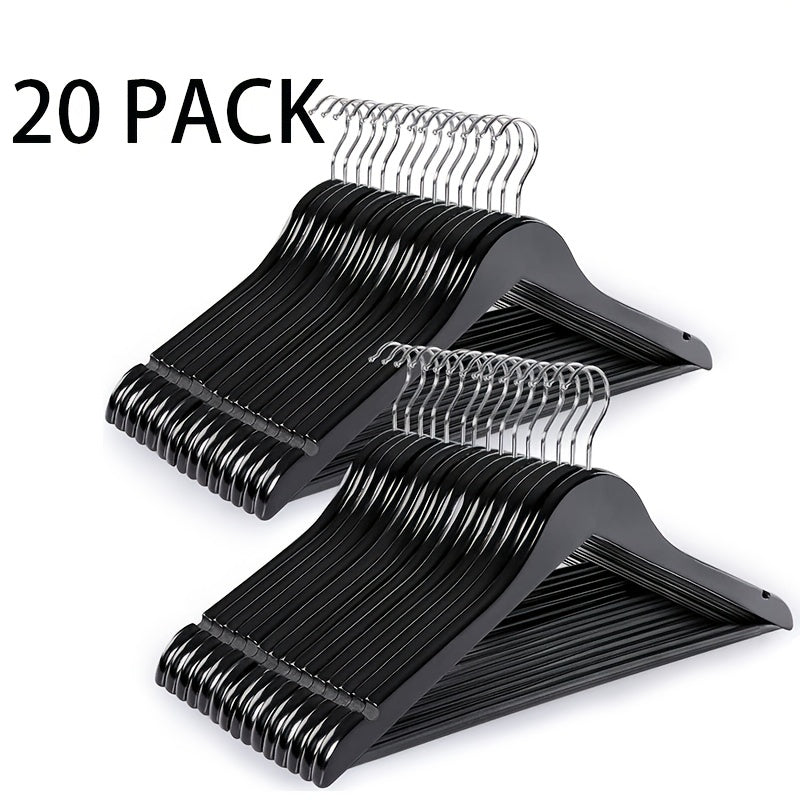 20 wooden hangers with non-slip pants drying rack feature, designed to hold heavy suits securely. Perfect for organizing clothes in your closet, bedroom, home, dorm or any living space. A must-have accessory for your bedroom.