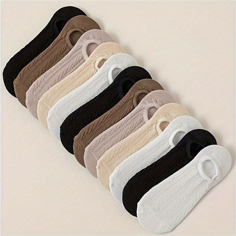 30 pairs of women's breathable no-show socks made of a polyester and spandex blend with moisture-wicking properties. These socks are black, white, and grey striped, with anti-odor