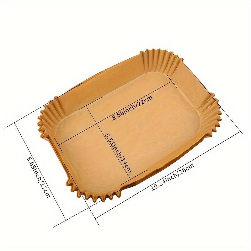 50 or 100 pieces of Disposable Air Fryer Liners, with measurements of 26.01cm X 16.99cm, suitable for bottom lining in air fryer pots, baskets, baking trays, and ovens. These rectangular paper liners are versatile kitchen accessories and baking tools.