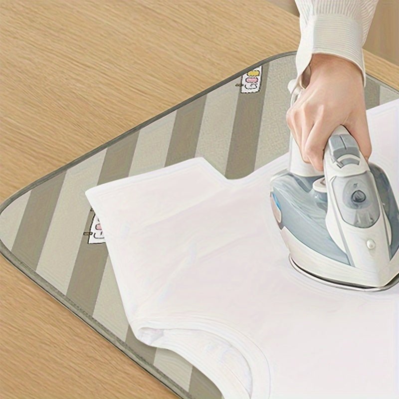 Make ironing clothes a breeze with this Portable Ironing Mat. Designed to be heat-resistant and moisture-proof, this foldable ironing board is your perfect assistant. The household small bed ironing cloth features a non-slip bottom for stable ironing and