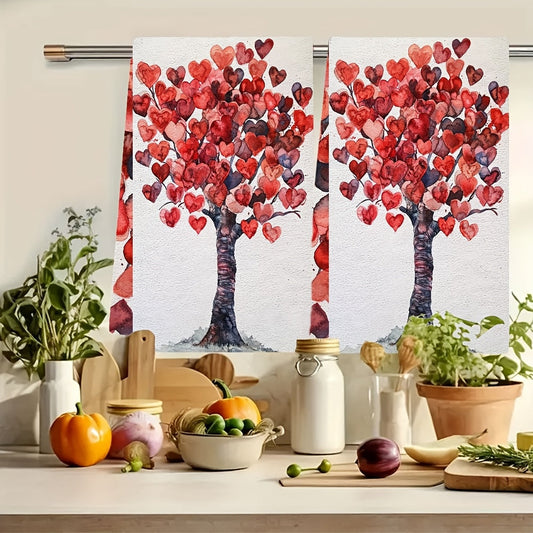 Two pieces of luxurious Valentine's tree kitchen towels that are incredibly soft and highly absorbent. These machine washable dish hand towels feature a romantic heart design, measuring 40.64x60.96 cm. Perfect for holiday decor and drying dishes, these