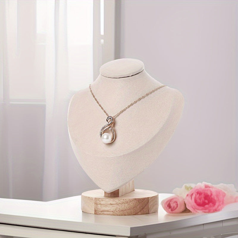 Wooden mannequin jewelry stand for displaying necklaces on dresser or window, ideal for home organization or retail showcasing.