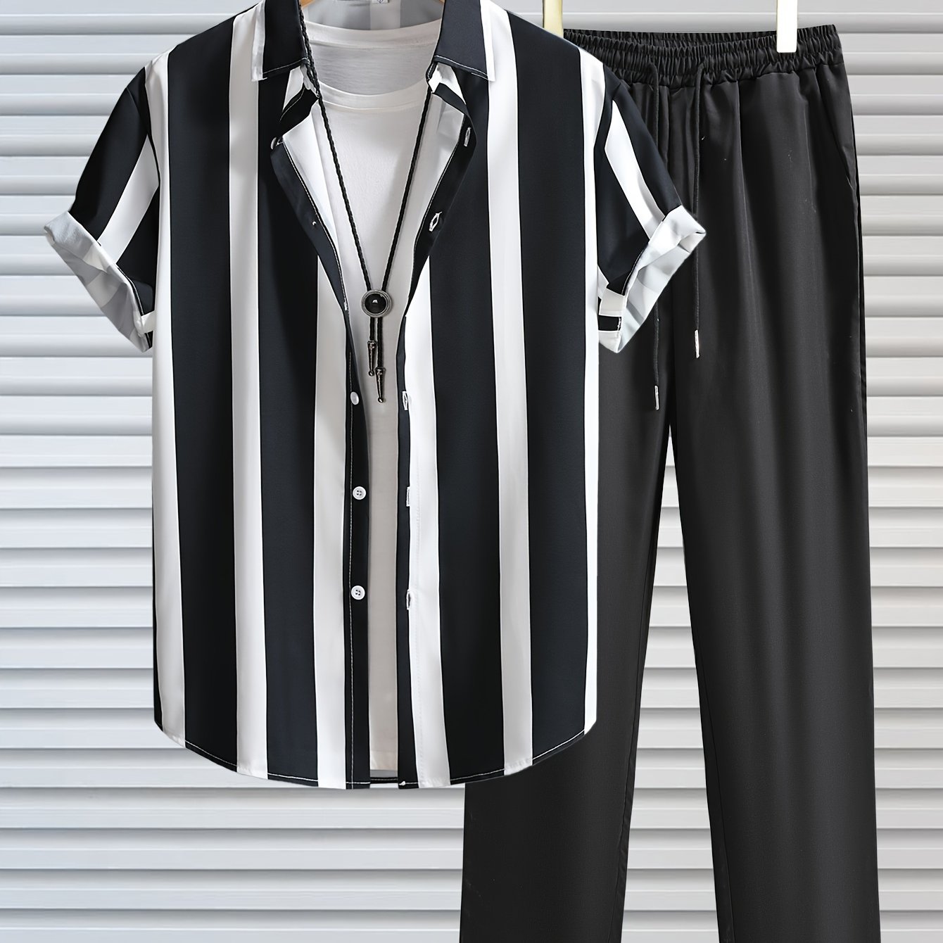 Men's casual outdoor outfit: striped lapel shirt and drawstring pants set.