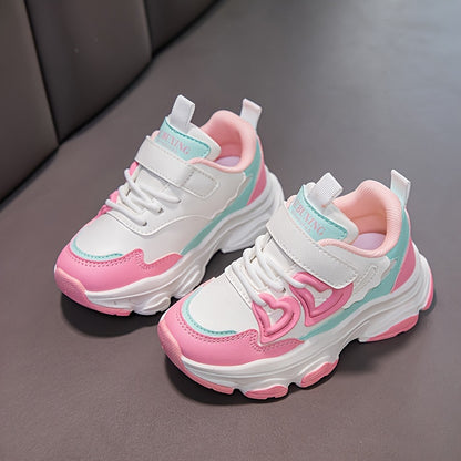 Girls' all-season fashion sneakers with sweet color block design and heart pattern, featuring easy closure, low-top PU upper, and rubber sole in pink and purple options. Perfect for daily