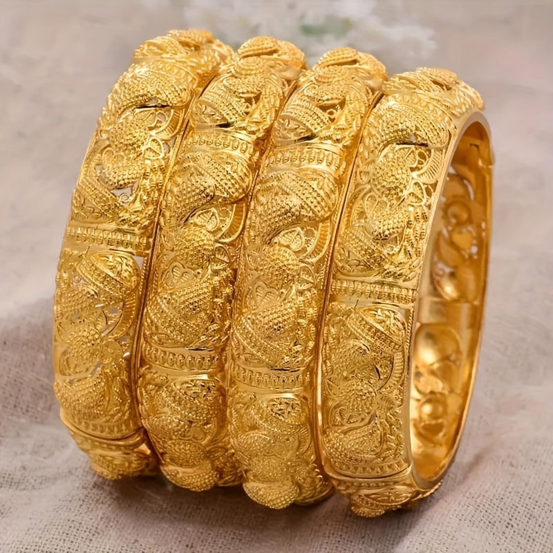 Handcrafted from 24K gold plated copper, this cuff bracelet features a tribal luxury hollow flower design. It makes for a stunning traditional engagement or wedding jewelry gift for women, with no mosaic material used in its creation. Perfect for daily