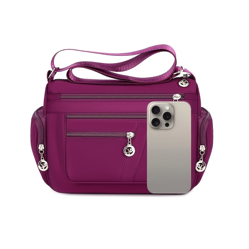 Women's versatile crossbody bag with adjustable strap, multiple compartments, zipper closure, and polyester lining for shopping, office, and travel, available in multiple colors.