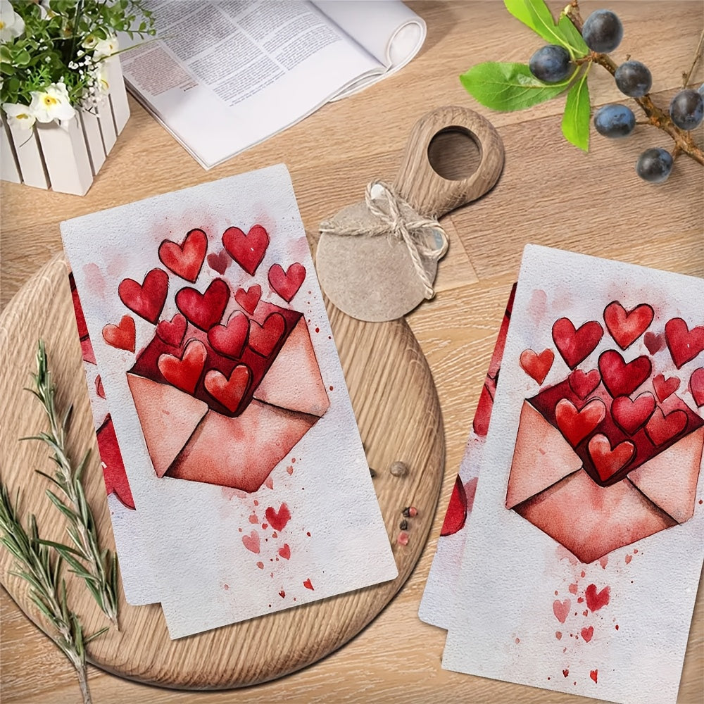 Two romantic Valentine's Day kitchen towels are available for purchase. These ultra soft and highly absorbent polyester dish hand towels measure 40.64x60.96 cm and feature a heart envelope design. They are machine washable and are ideal for holiday decor