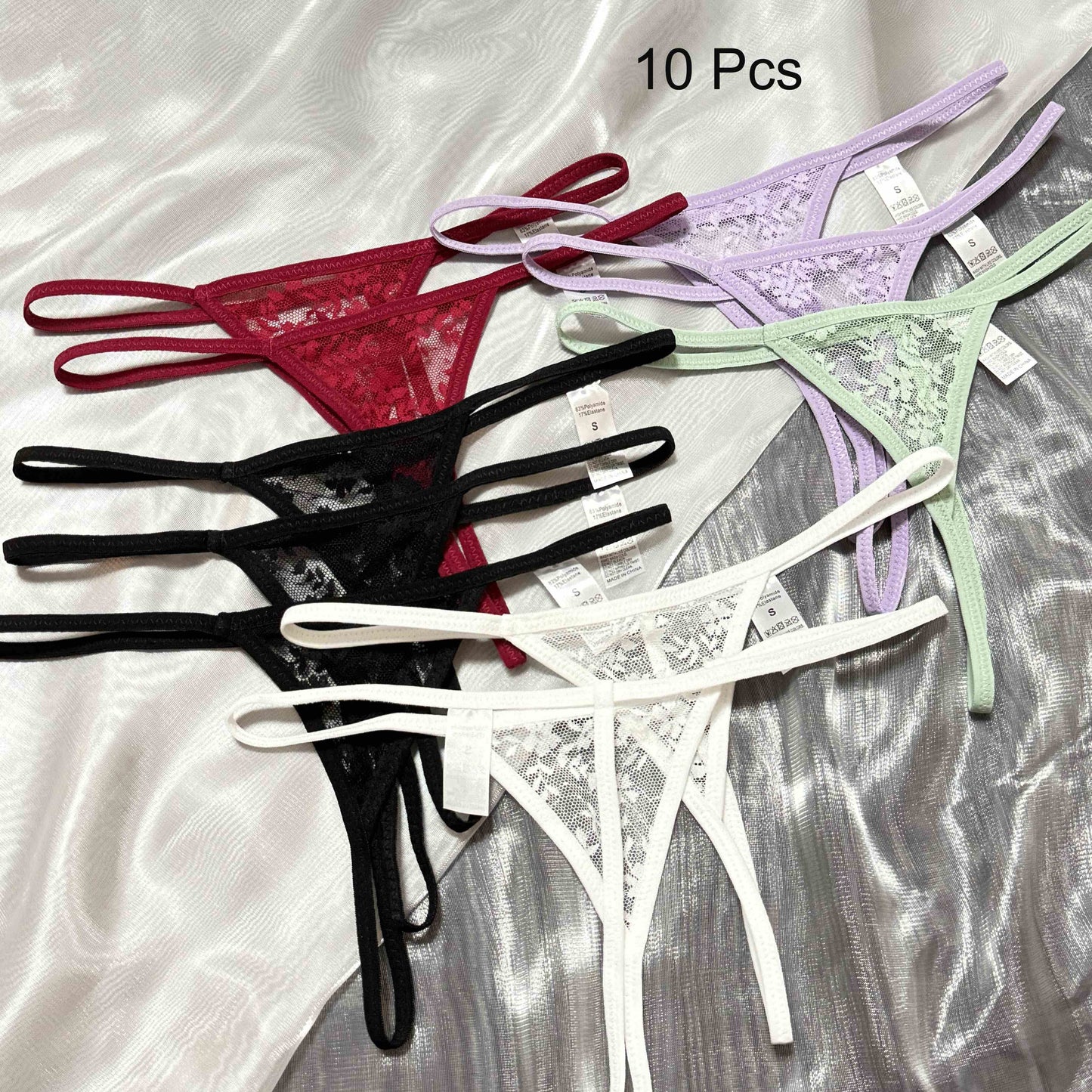 10-pack of sexy lace thong panties for women, low-rise polyamide fabric, transparent triangle design, adult theme, solid color with lace detailing