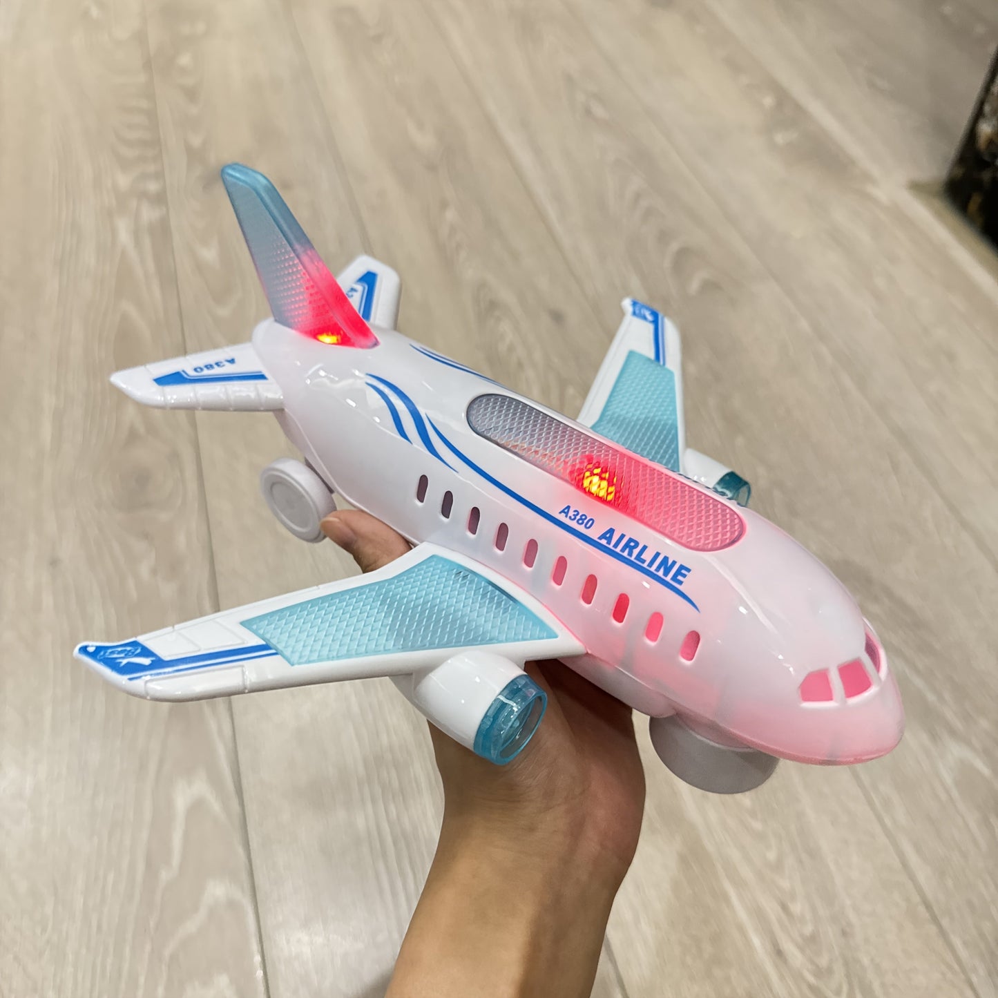 Battery-Powered Airplane Model Toy for Kids with Lights and Music - Durable Plastic Construction in White Color