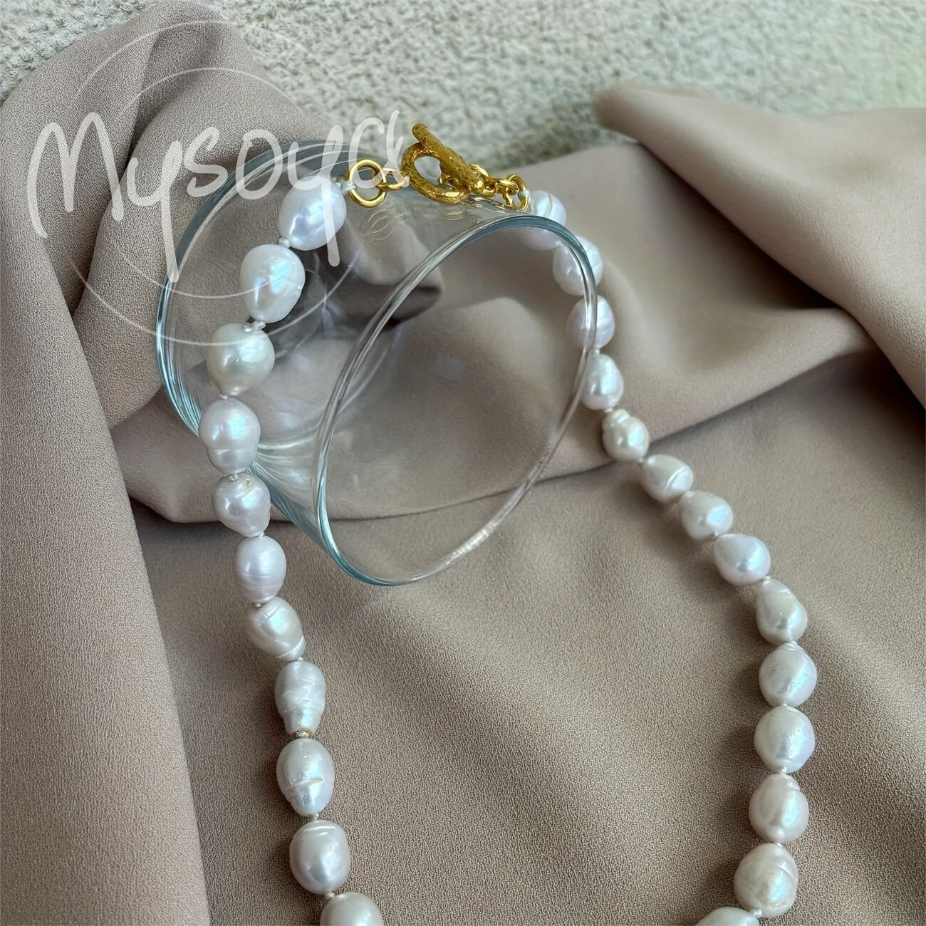 Exquisite handcrafted baroque pearl necklace featuring 10-12mm natural freshwater pearls. This stunning piece of jewelry comes beautifully packaged in a gift box, making it the perfect accessory for both daily wear and special occasions.