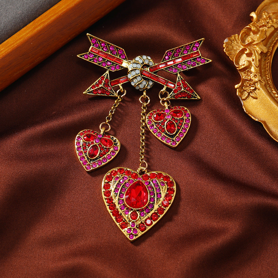 Vintage Heavy Industry Cupid Love Arrow Heart Brooch with Tassel Accent.