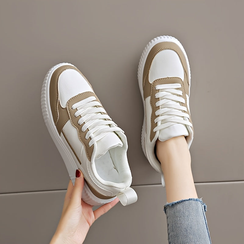 Women's low-top skateboard shoes with lace-up design, MD sole, lightweight, solid pattern, fabric lining and insole, and synthetic leather upper.