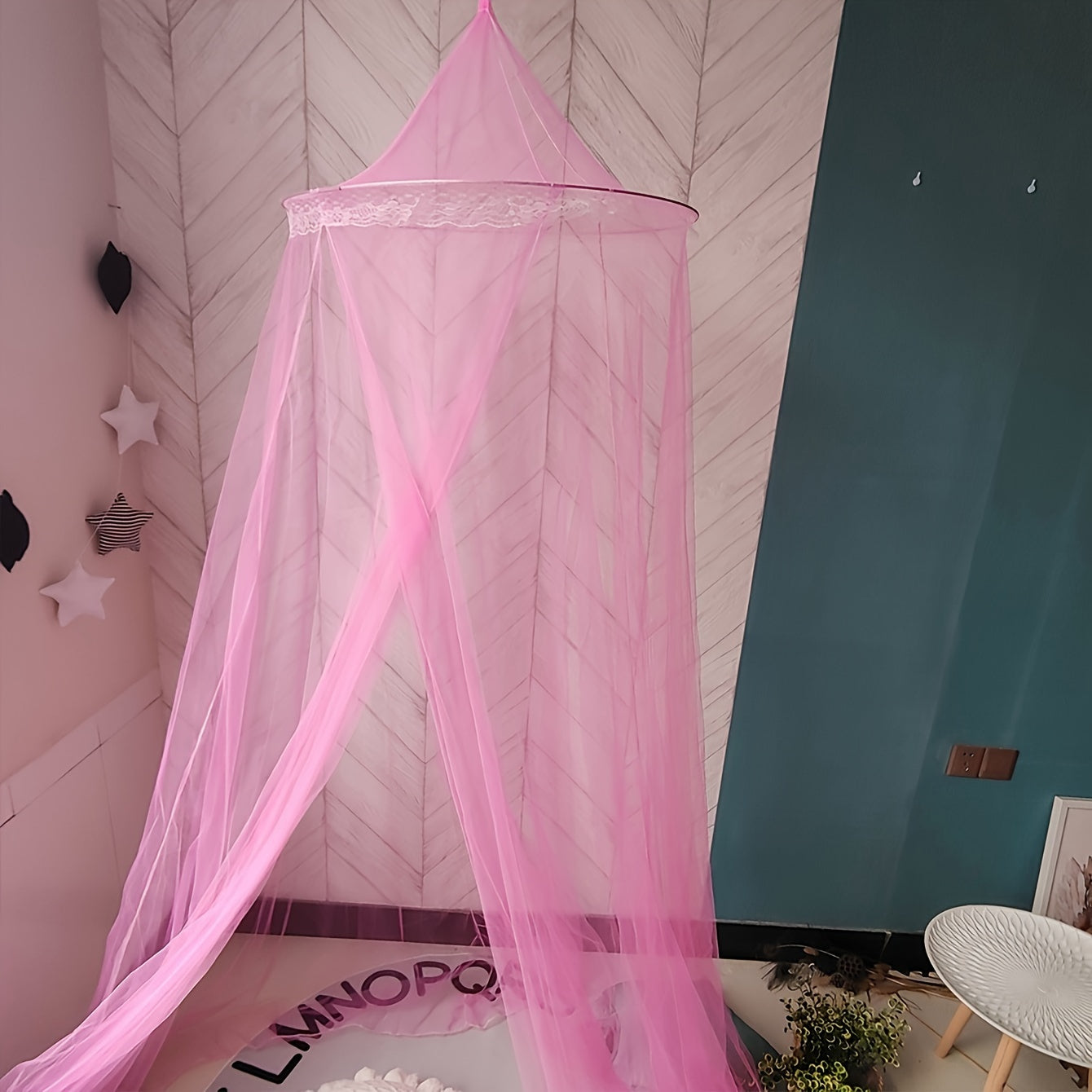 This black dome mosquito net features lace trim, a top and door ribbon, and ruffles. It is suitable for single, double, and queen beds, and makes a stylish addition to any bedroom decor. Made from polyester fabric weighing 200-250g, this net does not