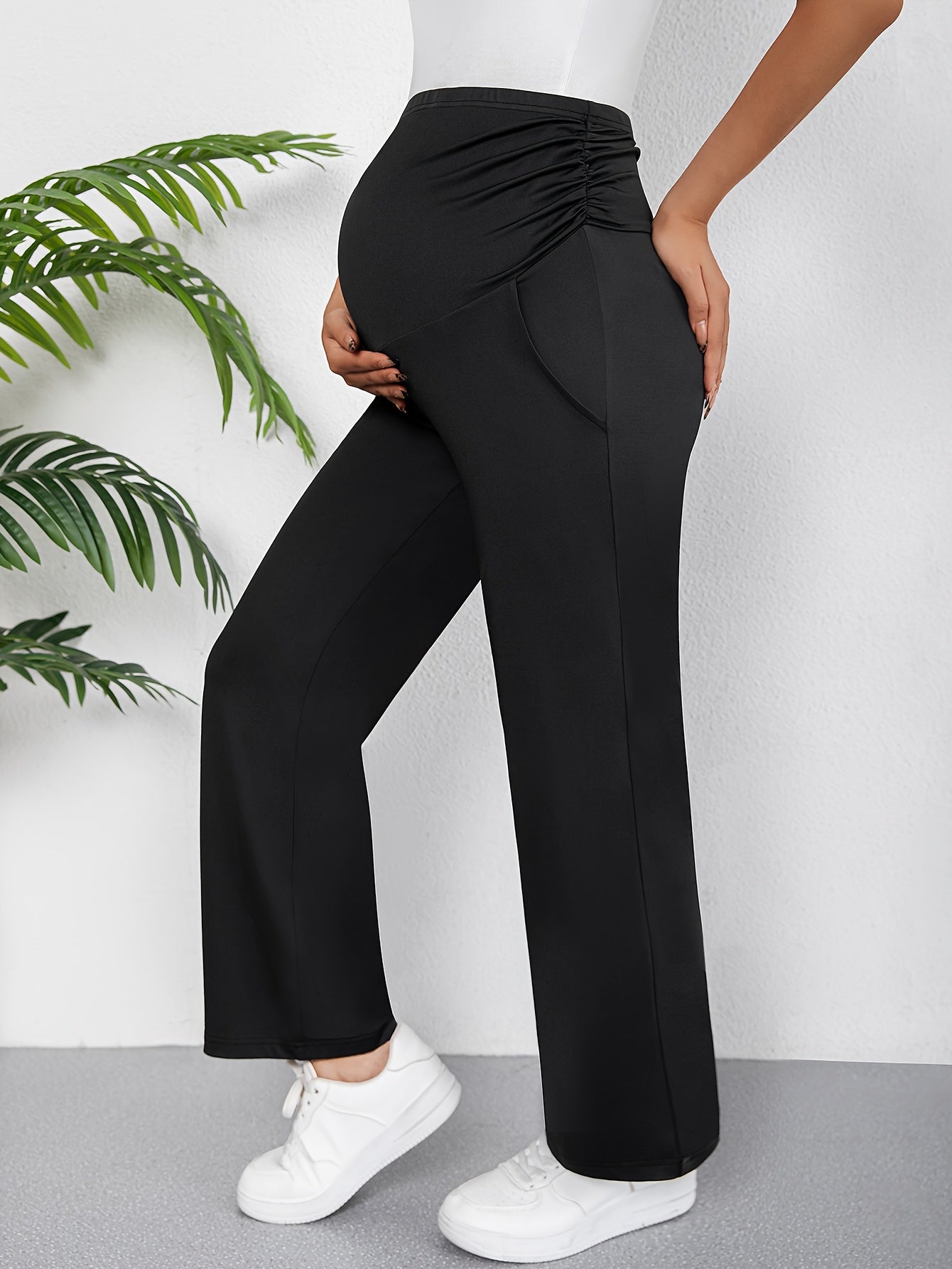 Chic maternity pants with high waist, slant pockets, and stretchy comfort for all seasons