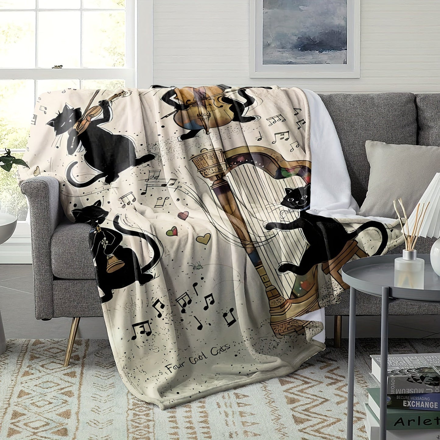 The Cozy Black Cat and Guitar Music Lover's Throw Blanket is made of soft, all-season flannel, making it perfect for outdoor travel and camping. This large blanket also makes a great gift.