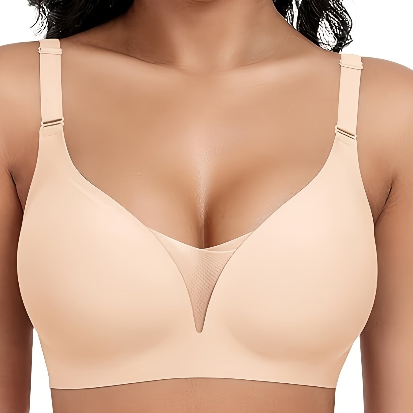 Wireless sports bra for women with seamless design for comfort and support, enhanced by lace and mesh details.