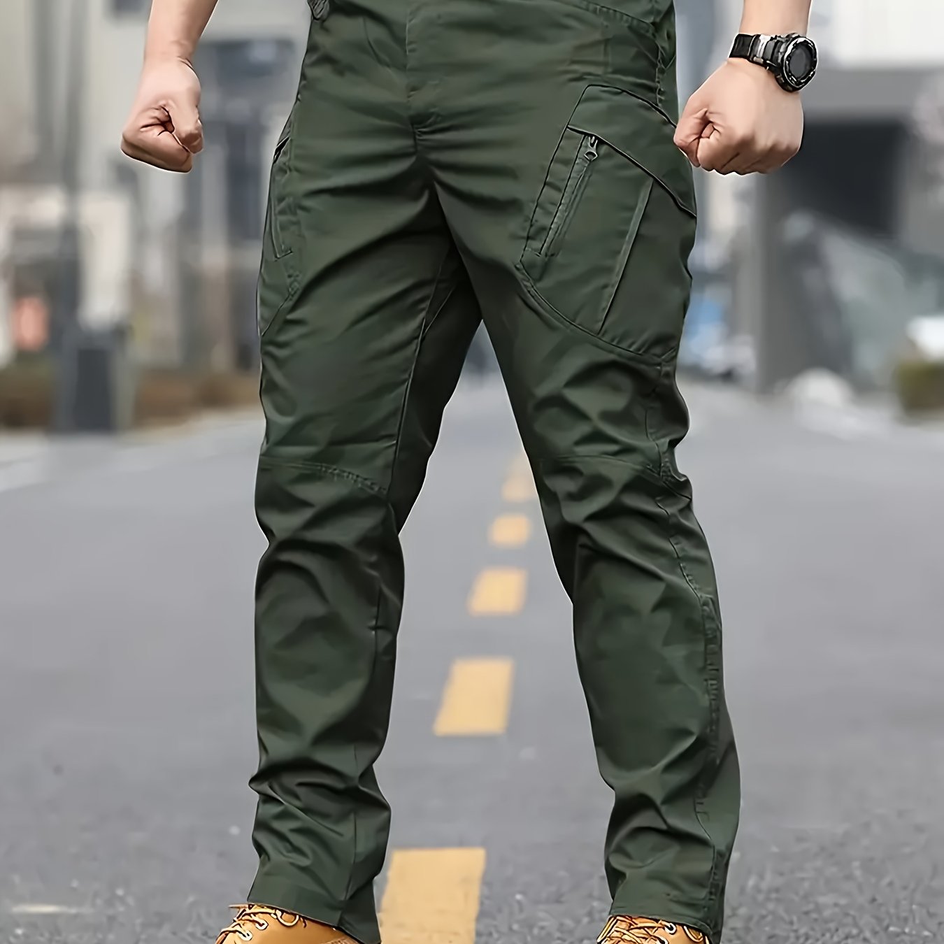 Men's olive green tactical cargo pants made of durable polyester with multiple pockets, perfect for hiking and outdoor adventures. Machine washable and ideal for camping gear.