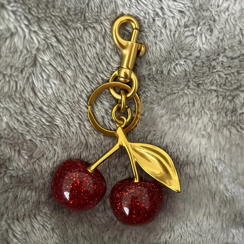 Glistening Cherry Fruit Keychain - Made of Alloy with Resin Pendant, featuring a Food-Inspired Circular Design, Adjustable C-Hook Clasp for Women's Purses & Handbags.