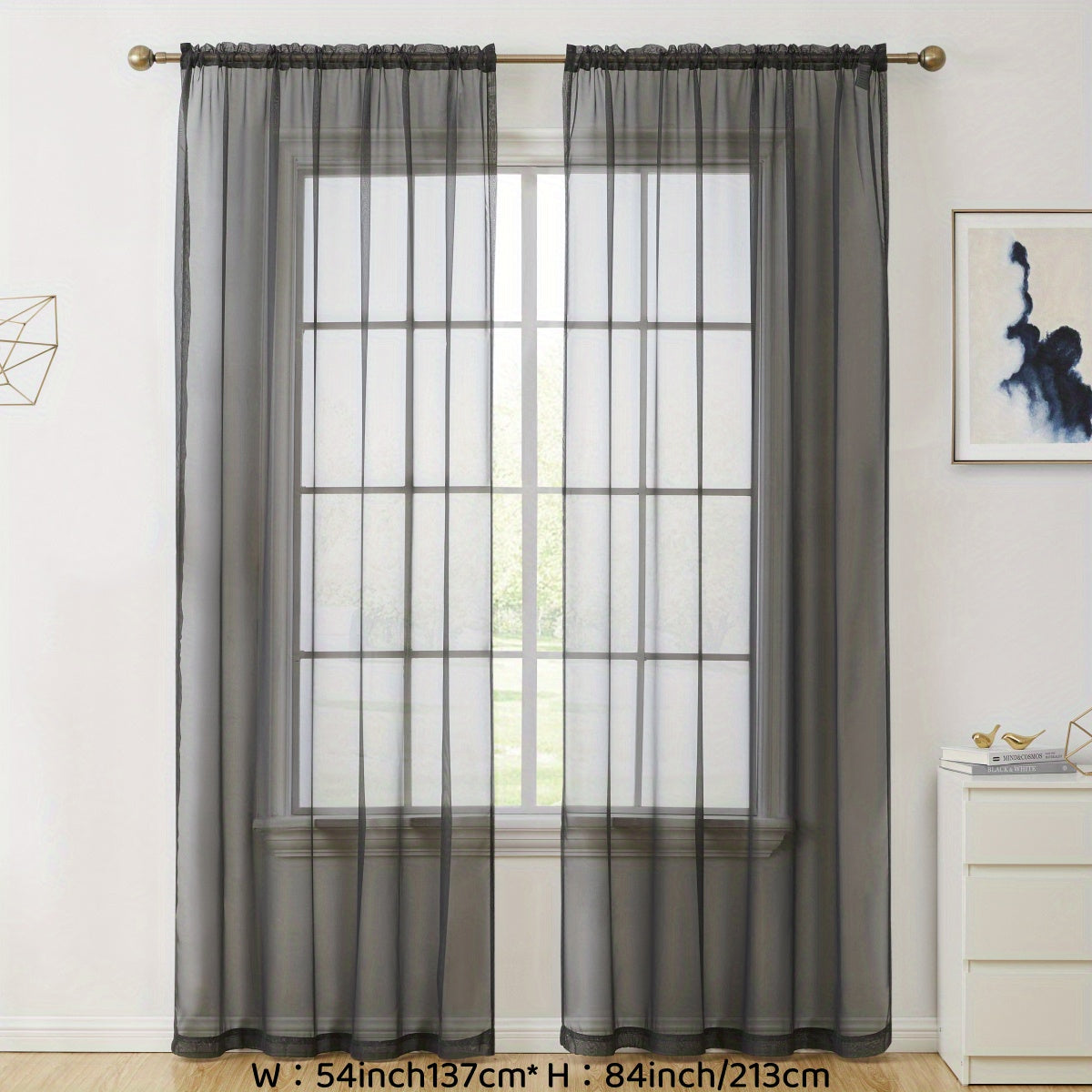 Enhance your decor with these elegant sheer voile curtain panels. Made of semi-transparent polyester, they feature a rod pocket design for easy hanging in your kitchen, bedroom, or living room. Create a romantic ambiance with these beautiful curtains.