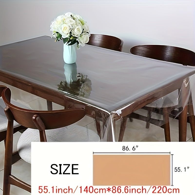 Clear PVC tablecloth for dining, parties, and camping. Oil-proof, easy to clean, and transparent. Cut-to-size design for versatile use in home and kitchen decor.